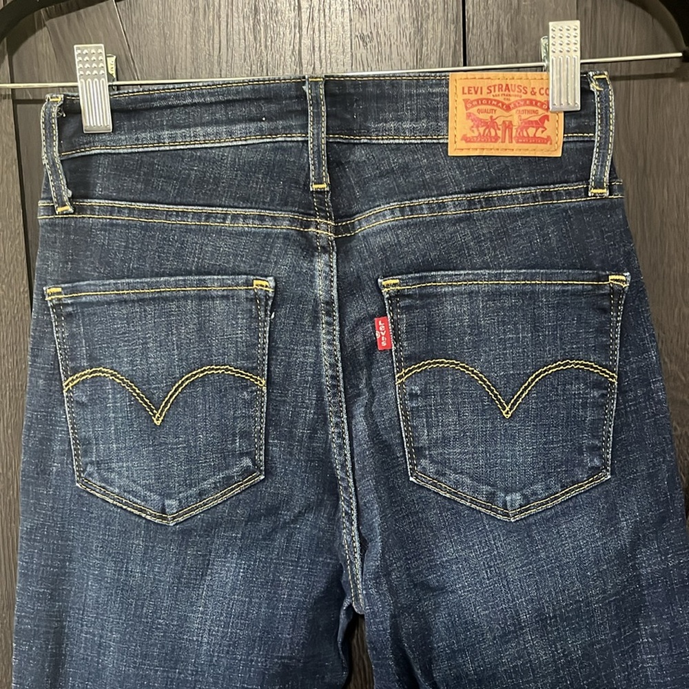 NWOT 721 high rise skinny size 27